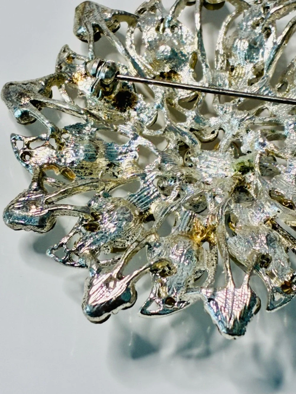 Crystal Floral Burst Brooch - Light Blue Rhinestone Accent